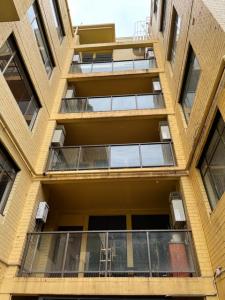 Installed Bird Netting to Apartment Balconies to Stop Pigeons