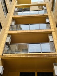 a_class_bird_control_installed_bird_netting_to_apartment_balconies_to_stop_pigeons_gallery_image_02
